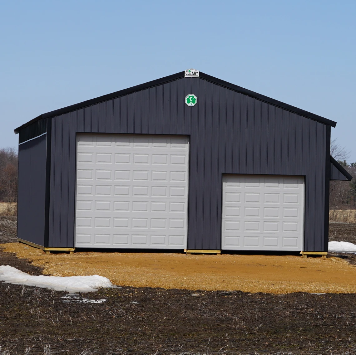 Two-door metal garage in rural area